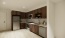 Kitchen with stainless steel appliances and wood cabinets